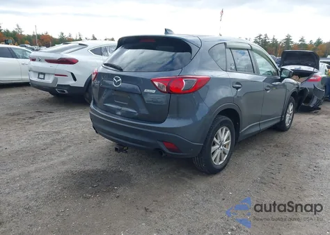 2013 Mazda Cx-5 Touring z USA, uszkodzony, nr VIN JM3KE4CE9D0130476